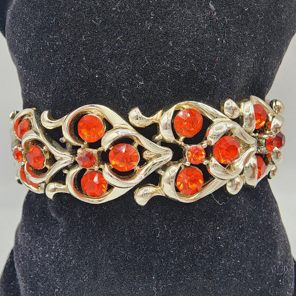 Gold Bracelet With Fiery Red Accents